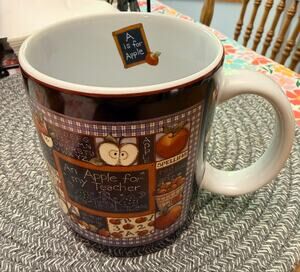 Mug from 1997 "An Apple for My Teacher" collector mug designed by Susan Winget